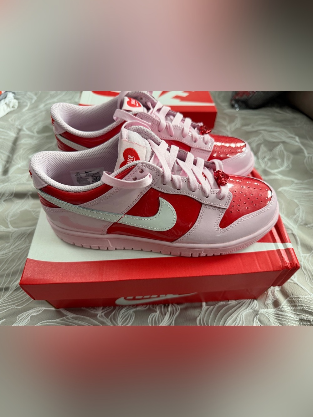 Nike Kids Pink and Red Low-Top Sneakers with White Swoosh